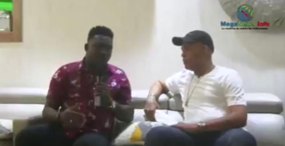 Le journaliste Ralph Balan et M. Martelly 