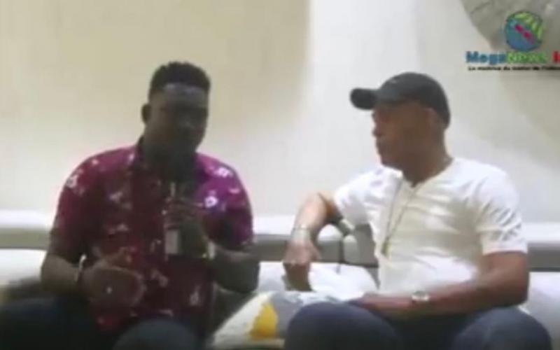 Le journaliste Ralph Balan et M. Martelly 
