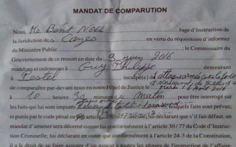 Le mandat de comparution de Guy Phillipe